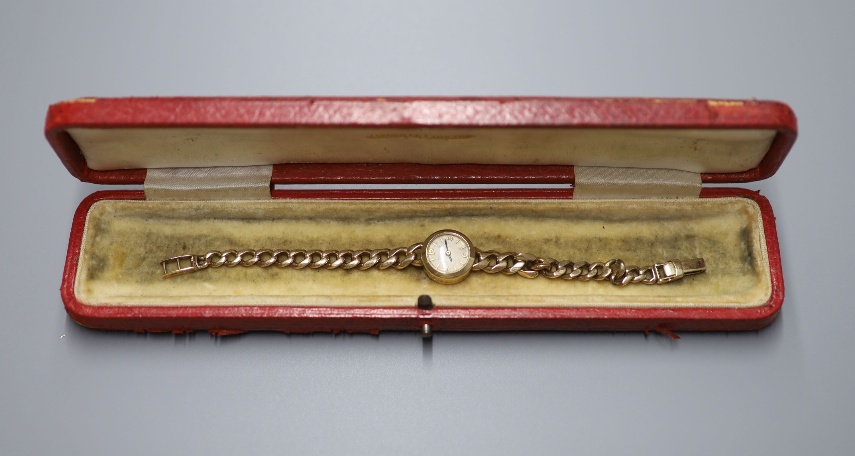 A lady's 1960's 9ct gold Jaeger LeCoultre manual back wind wrist watch, on associated 9ct gold curb link bracelet, overall 16.2cm, gross weight 19.2 grams, with Jager LeCoultre box